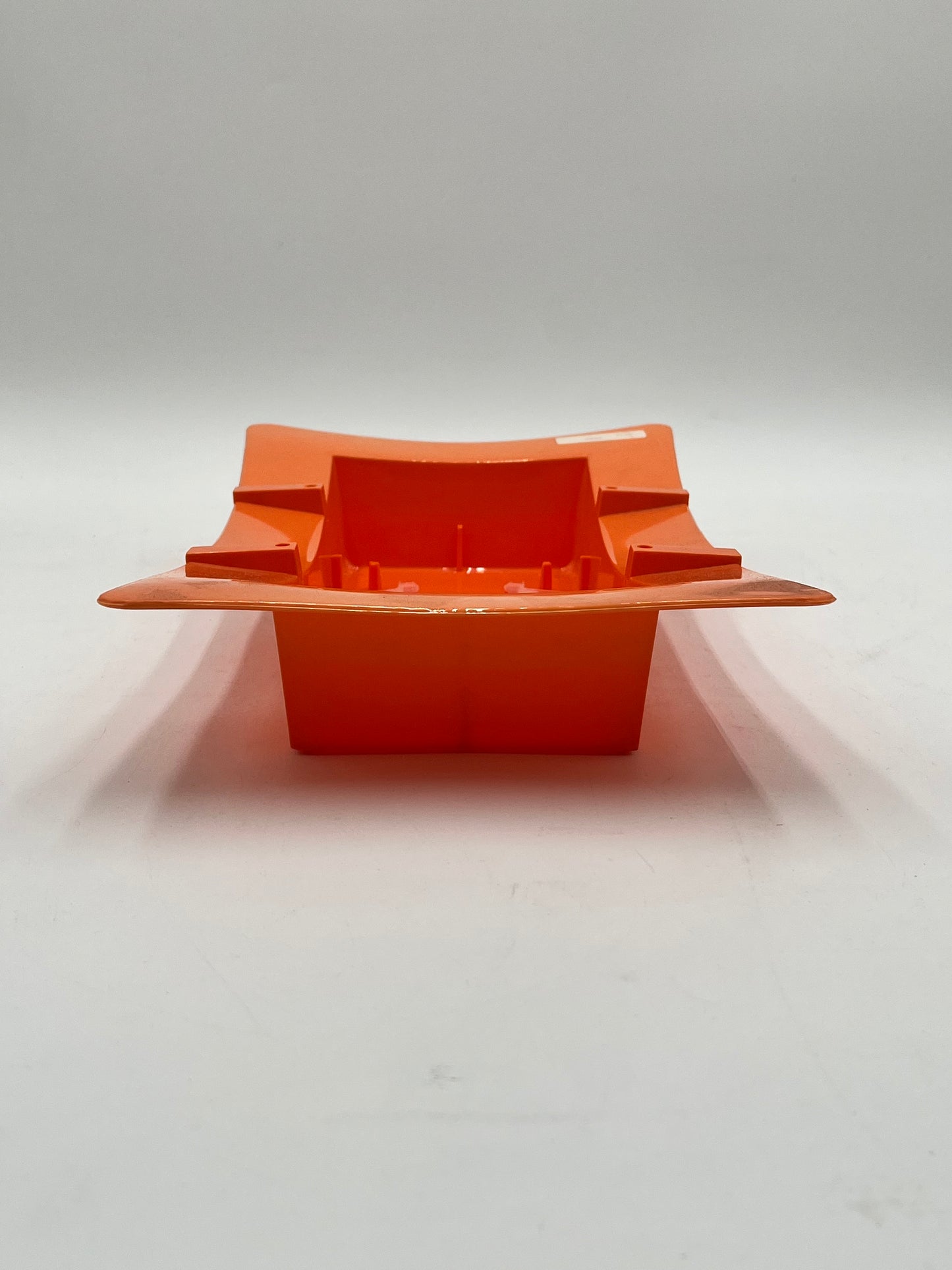 FoamLock Floral Tray in orange- 13" base fits full floral foam brick with built-in foam clip. Durable & reusable tray for $9.99 @ floralsuppliespoint1.com