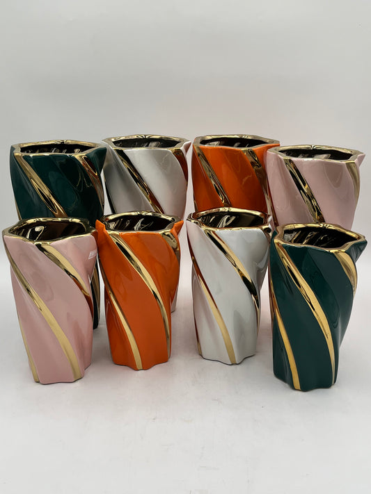 Gilded Helix ceramic vases with gold swirl in Pink, Orange, Green & White. Also available in 2 sizes M-$14.99 & L-$19.99. Sold by floralsuppliespoint1.com.