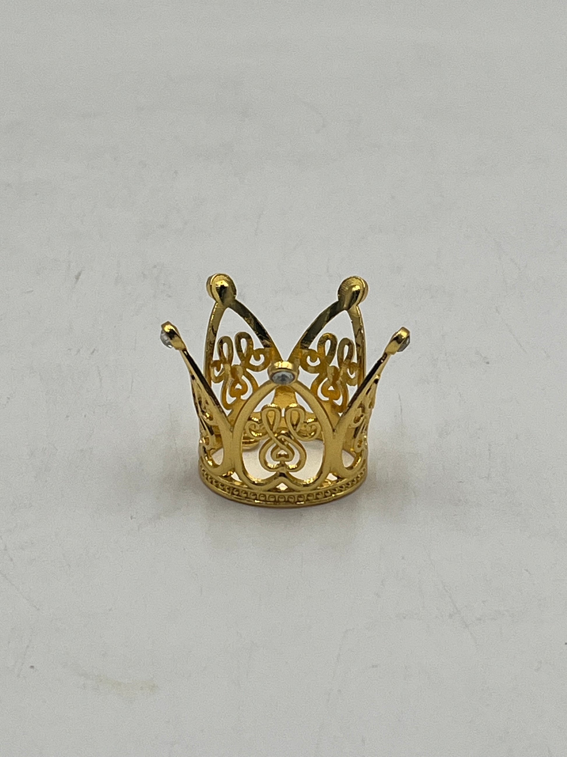 Mini gold crown for floral arrangements, cakes, and party favors. Perfect for weddings, showers & crafts. Sold individually or wholesale by floralsuppliespoint1.com