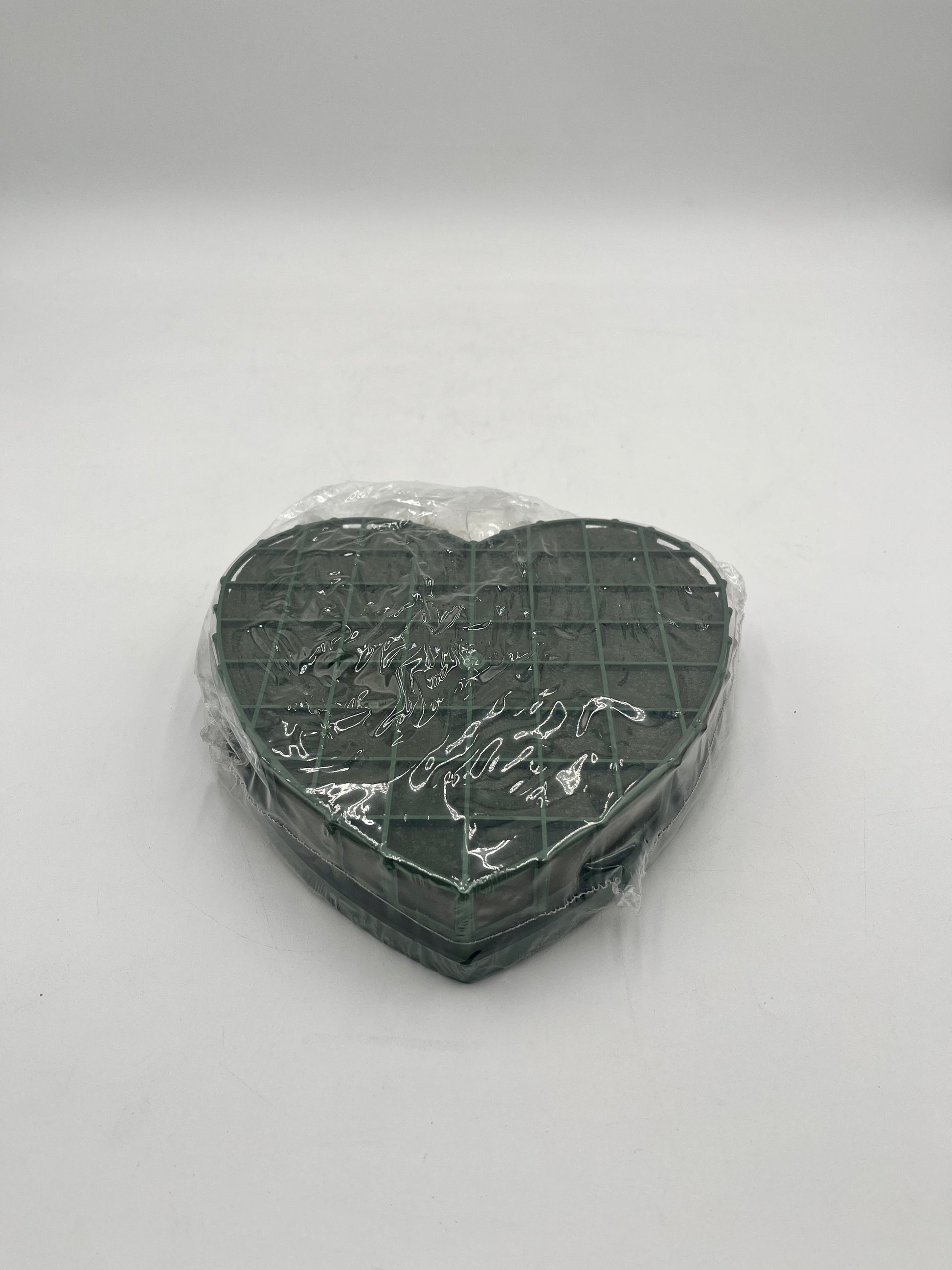 Heart-shaped floral foam wreath bases, 8" & 12", keep flowers fresh with water-absorbing foam & sturdy backing. Sold by floralsuppliespoint1.com.