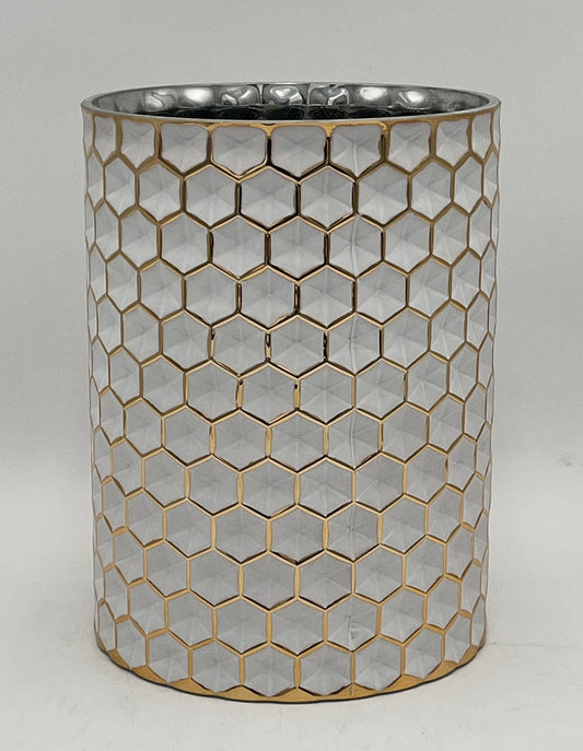 The Hexara Column 9.5x6.5 Op by Floral supplies Point is a cylindrical silver column with a modern honeycomb relief pattern outlined in gold, displayed on a plain white background.