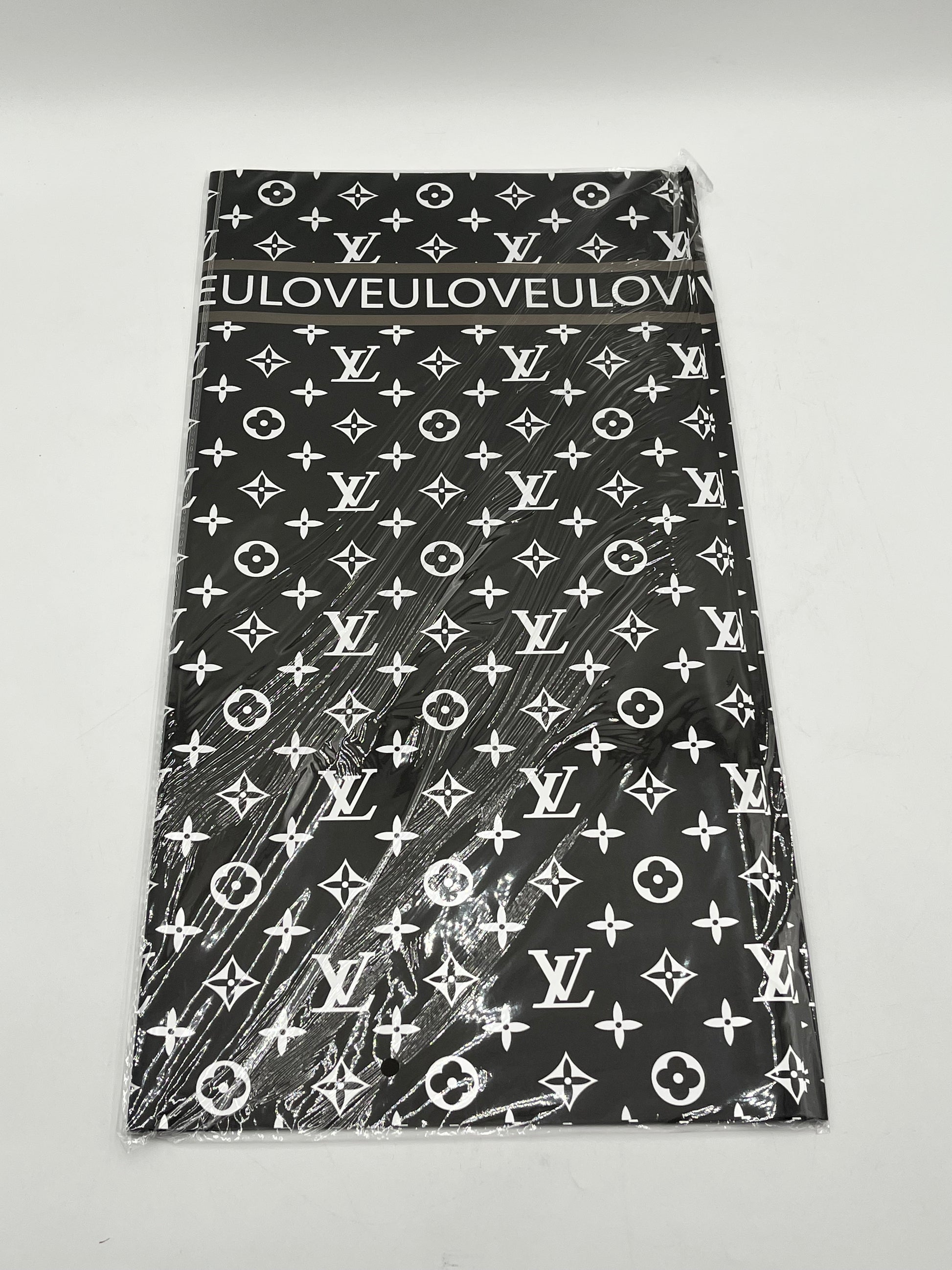 LOVEU LV Luxe Set wrapping paper in Black with iconic LV monogram. 20 sheets of 22"x22", Sold by floralsuppliespoint1.com for $9.99