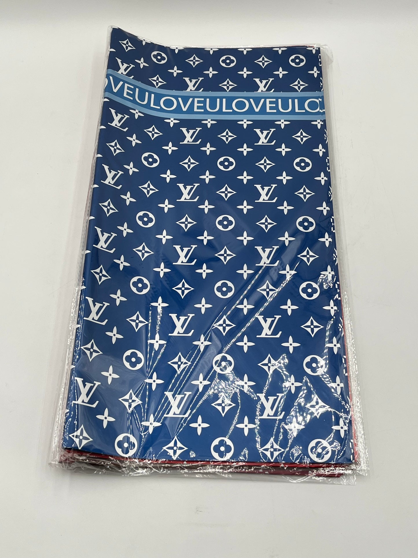 LOVEU LV Luxe Set wrapping paper in Blue with iconic LV monogram. 20 sheets of 22"x22", Sold by floralsuppliespoint1.com for $9.99