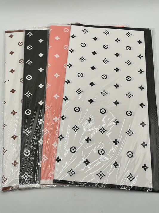 LV Luxe Monogram Edition wrapping sheets in Brown, Black, Peach & White, 22x22" (20 sheets) for floral & gift use. Sold by floralsuppliespoint1.com for $9.99