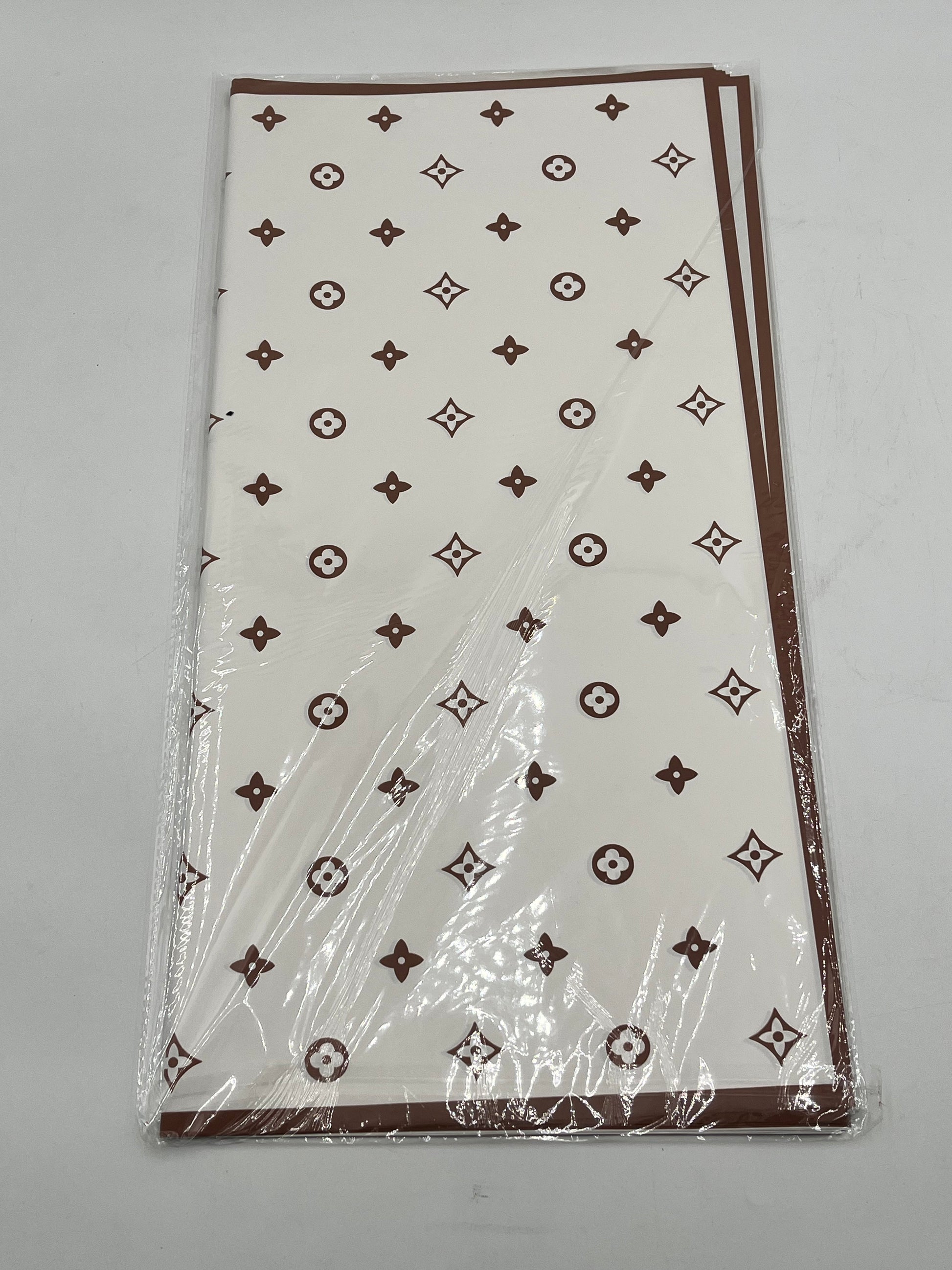 LV Luxe Monogram Edition wrapping sheets in Brown, 22x22" (20 sheets) for floral & gift use. Sold by floralsuppliespoint1.com for $9.99