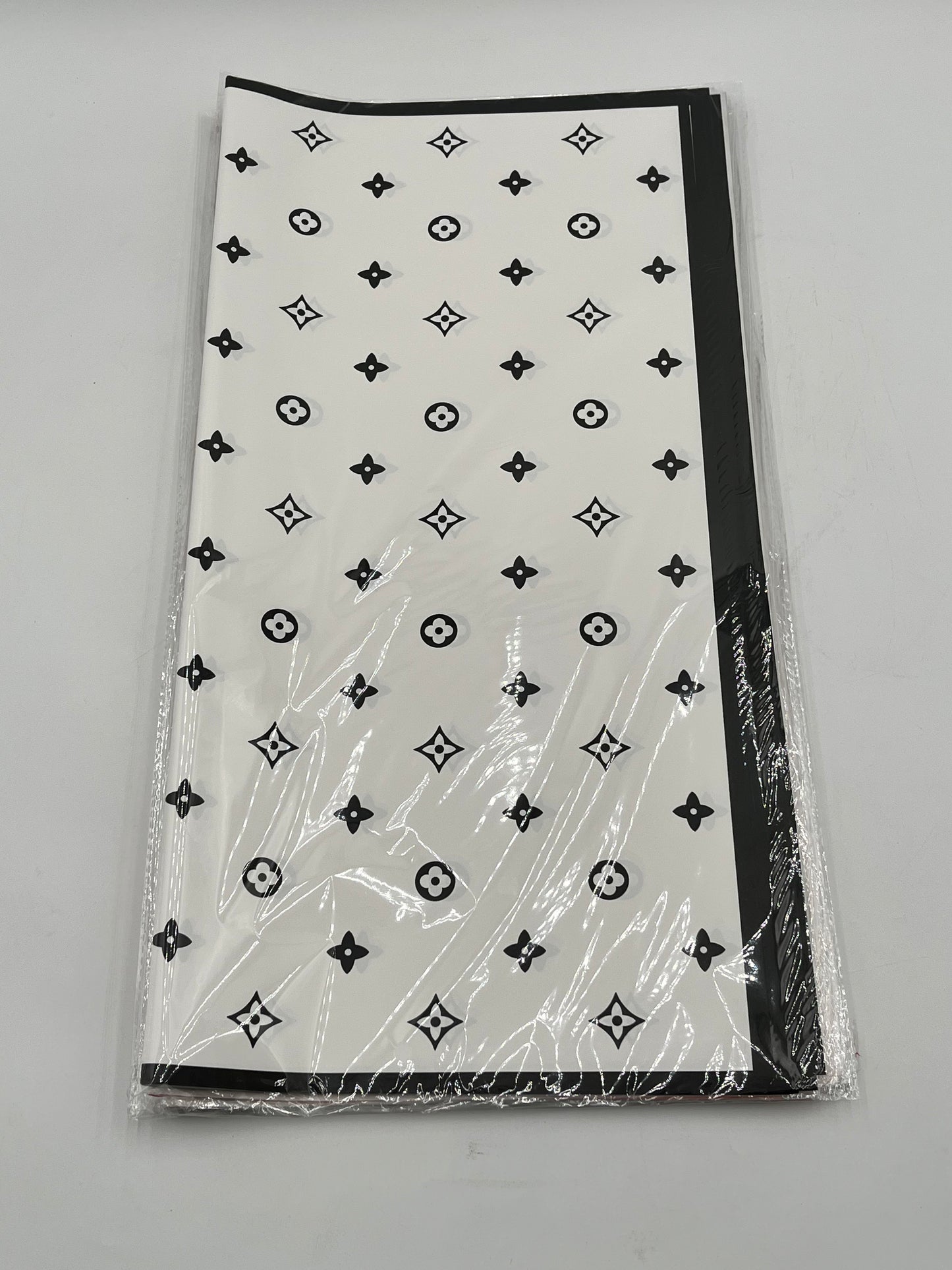 LV Luxe Monogram Edition wrapping sheets in White, 22x22" (20 sheets) for floral & gift use. Sold by floralsuppliespoint1.com for $9.99