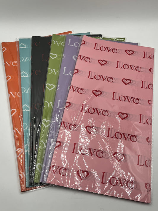 LOVE Wraps Edition in Orange, Light Blue, Black, Light Green, Lavender & Pink, 22x22 inch sheets with heart and “LOVE” design. Sold @ floralsuppliespoint1.com for $9.99