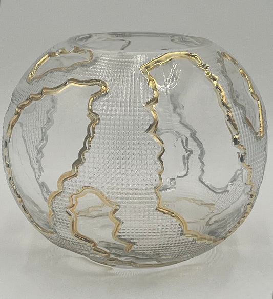 The Lumen Globe 6.5x3.5 Op by Floral supplies Point is a round, clear glass vase with a textured surface and gold-outlined continents, creating a sculptural globe effect that highlights landmasses against the transparent background.