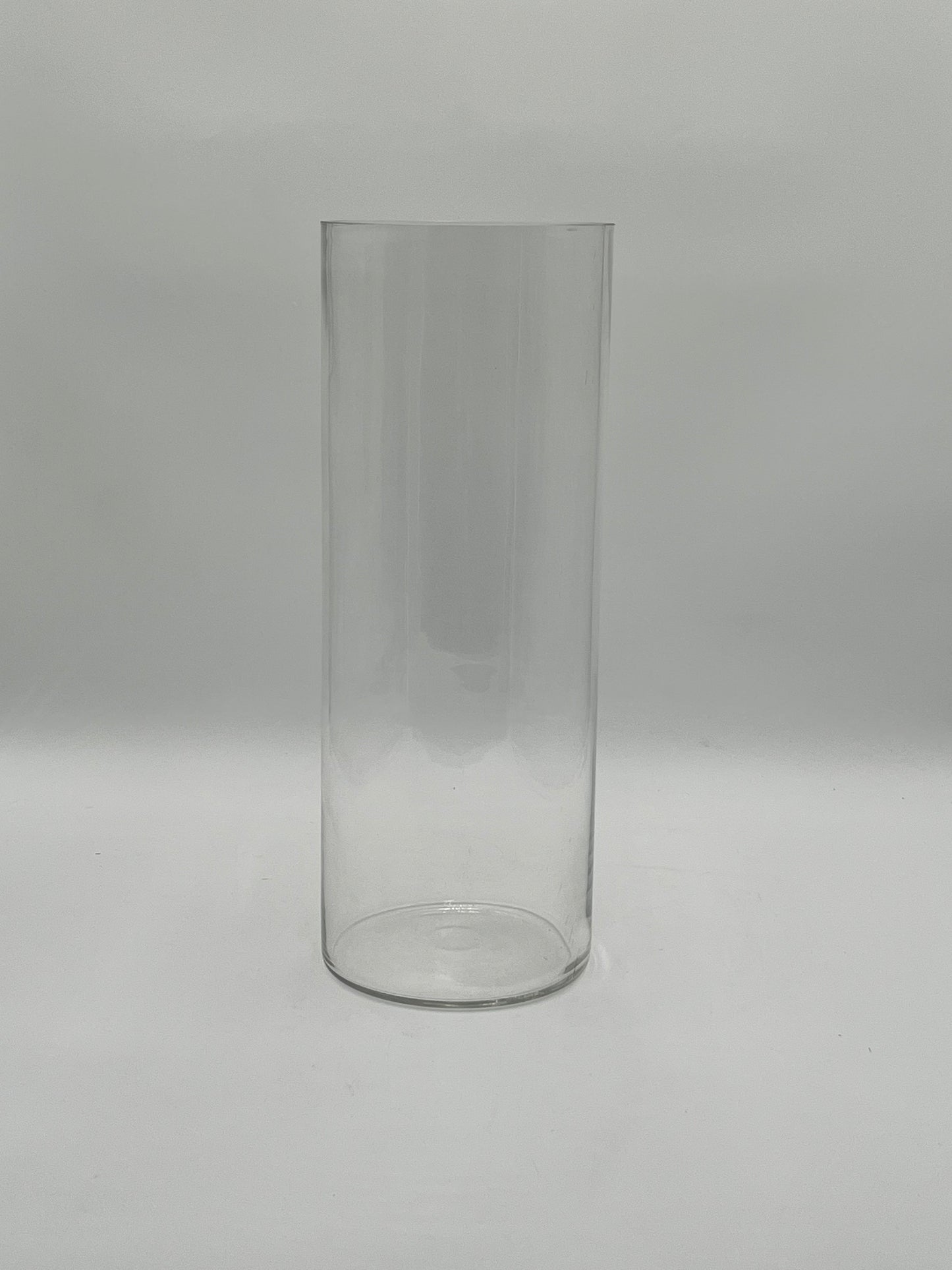 The LuxeGlass Cylinder Collection are clear glass cylinder vases in four sizes, ideal for floral designs, candles, or events. Sturdy, elegant, and sold individually by floralsuppliespoint1.com.