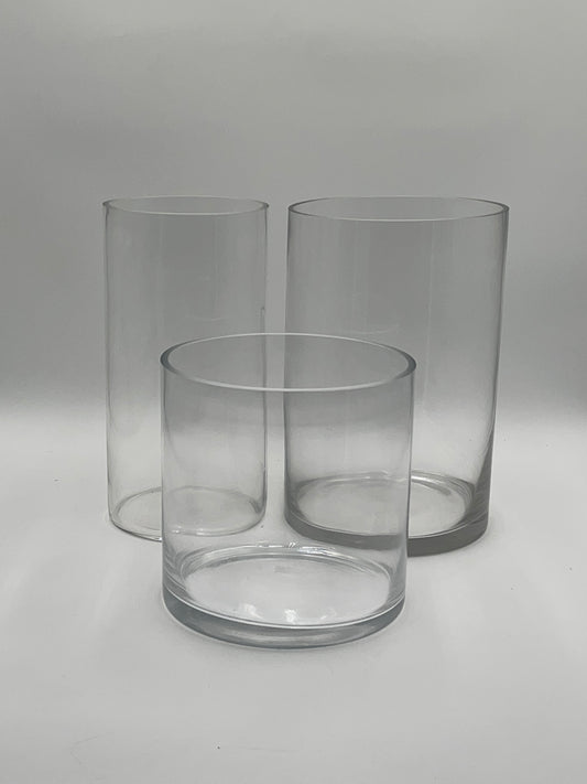 LuxeRound Cylinder Trio clear glass vases in small, medium, and large sizes for floral arrangements, home décor, or event use. Available individually and bulk at floralsuppliespoint1.com.