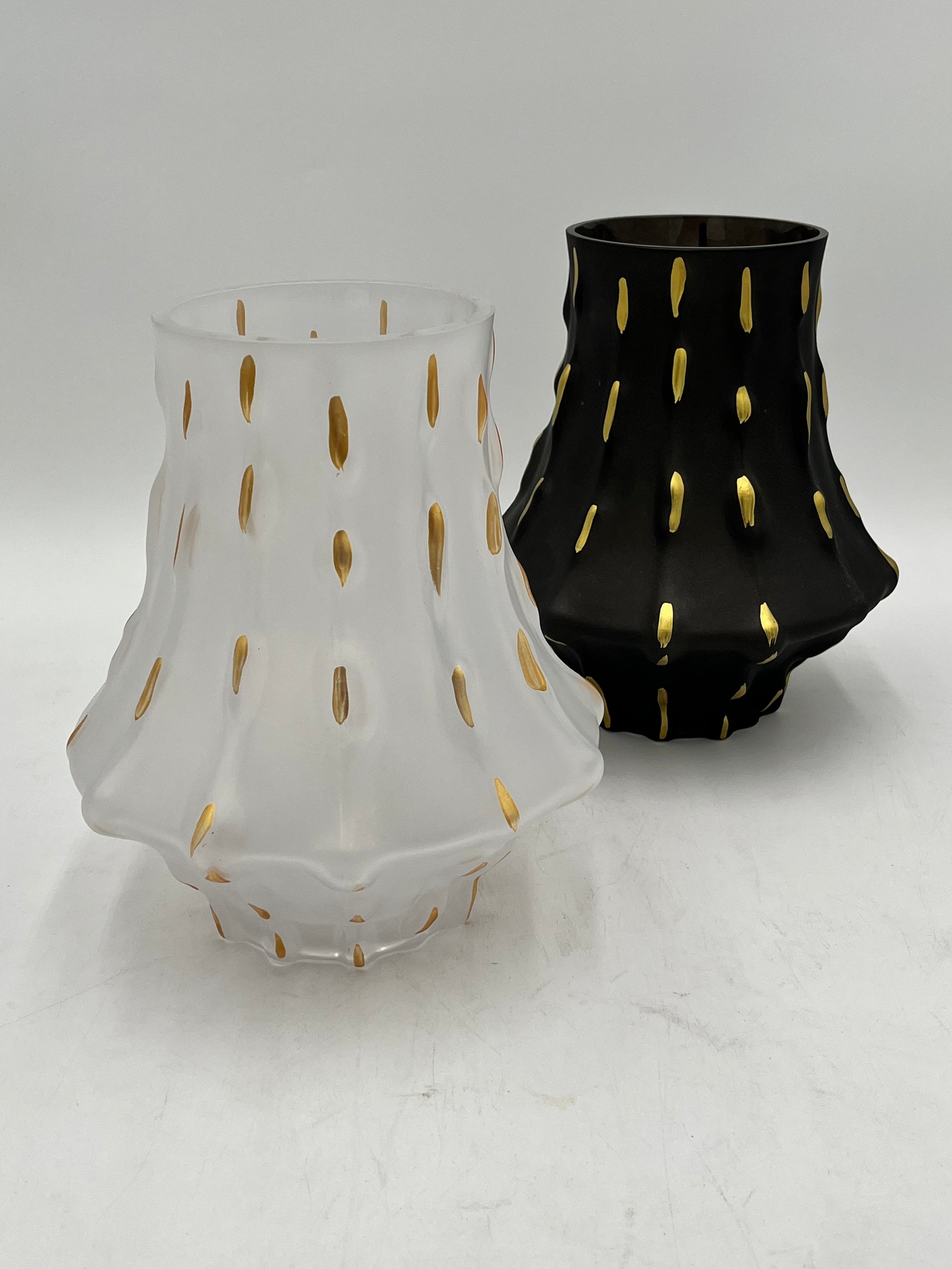 Midnight Ember Set showcase a dramatic & sculptural silhouette in matte white or black, providing a sophisticated, modern backdrop for the decorative accents.