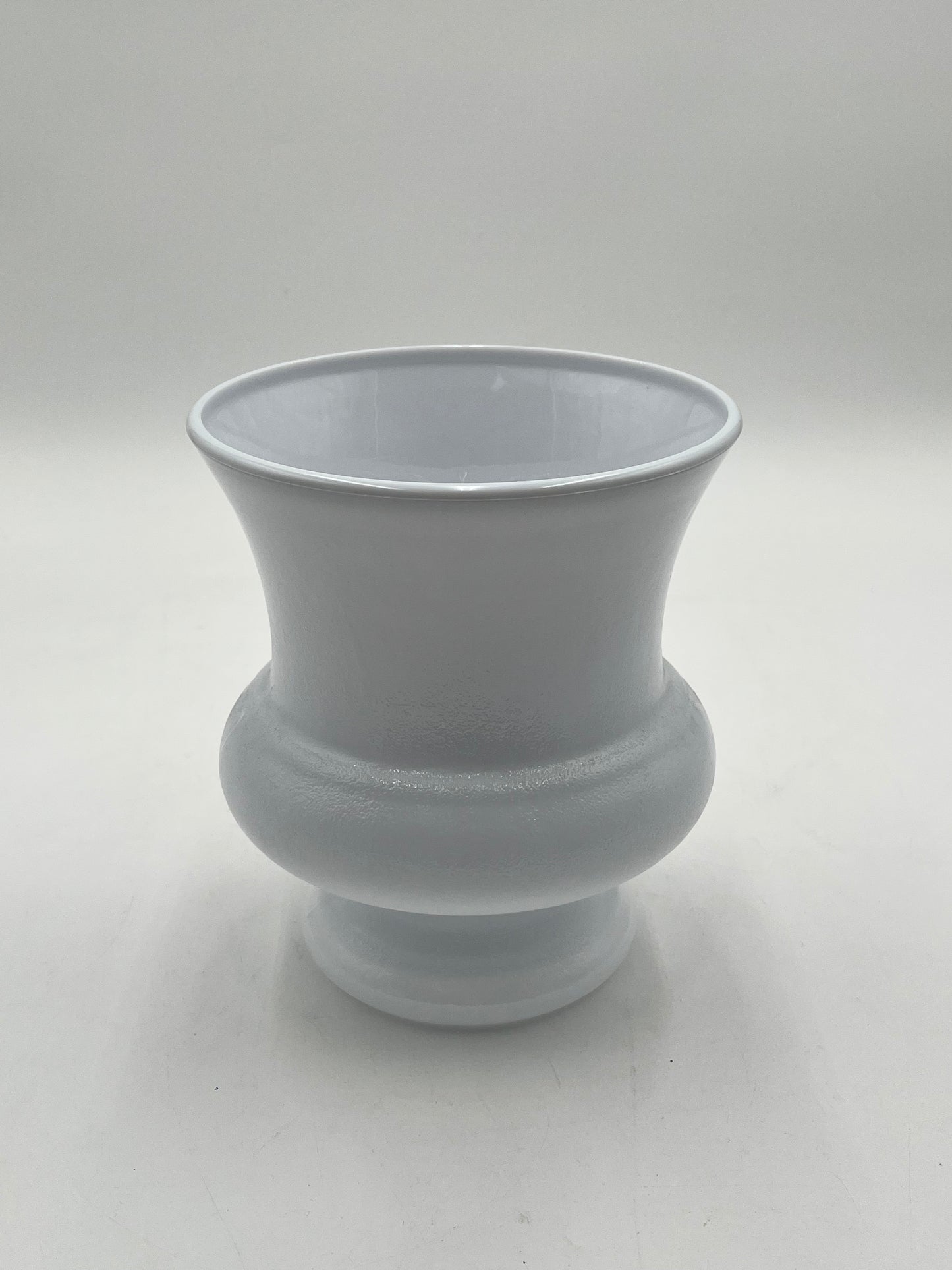 Elegant white plastic urn in medium 8x7 size. Perfect for floral, memorial or décor use. Sold by floralsuppliespoint1.com for $4.99 each.