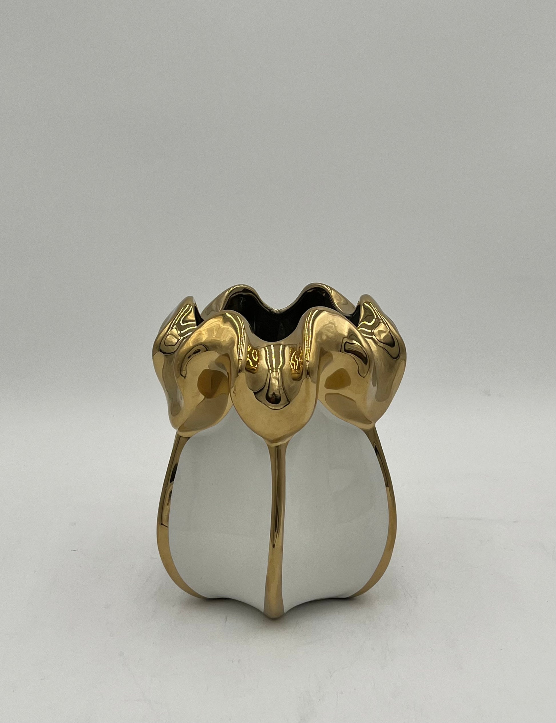 Petal Crest ceramic vase in white with gold accents. Elegant floral décor pieces sold by floralsuppliespoint1.com.