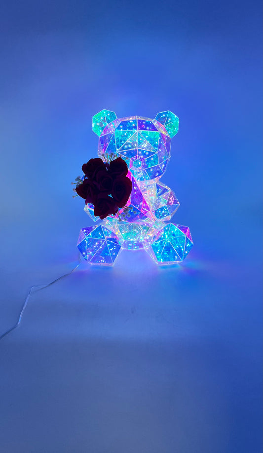 Iridescent light-up Rose Crystal Bear with red roses, USB cable, and pink gift box. Sold by floralsuppliespoint1.com for Individual  $34.99 retail or $160 wholesale for 8-count case.