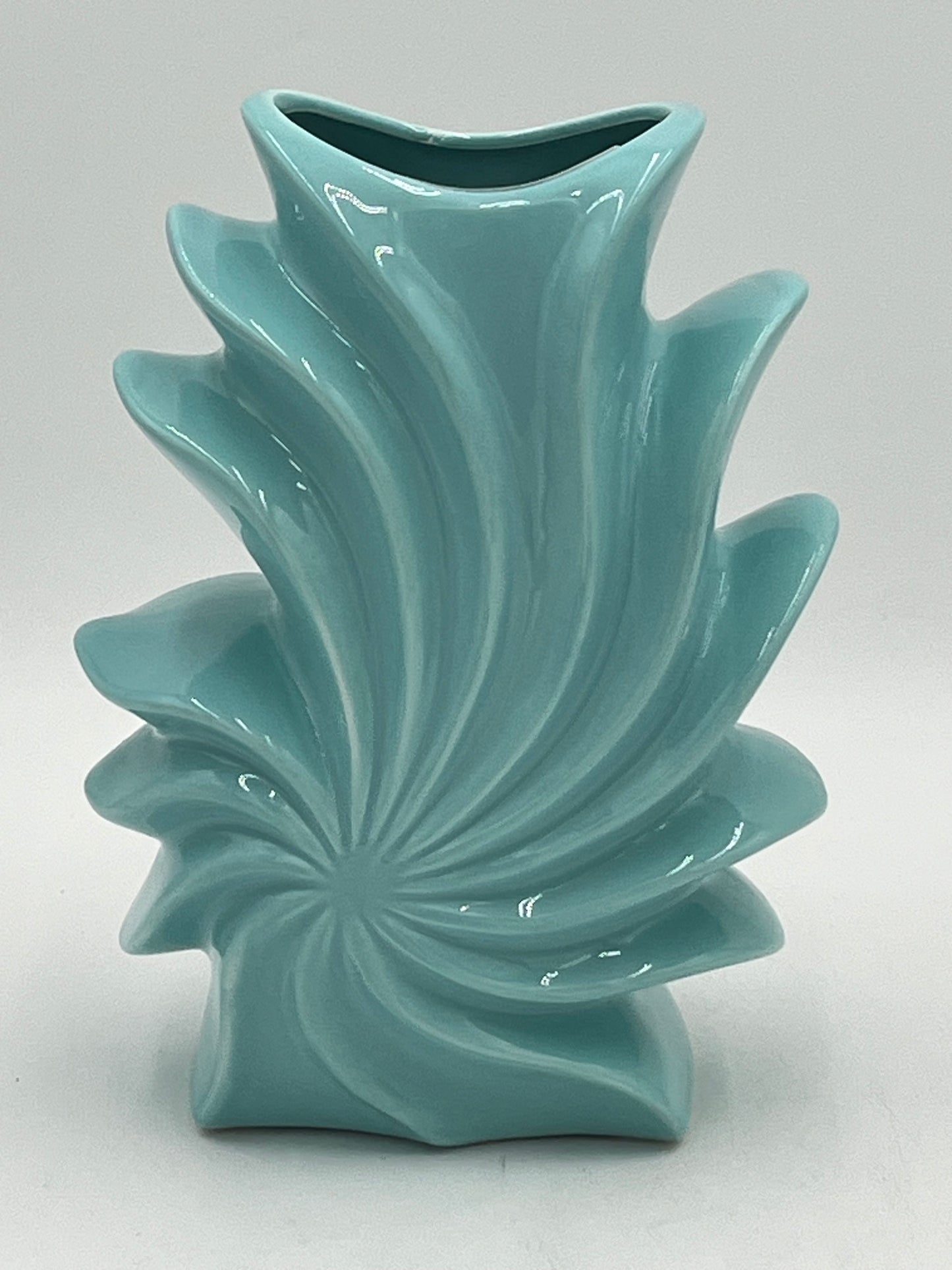 Shellflare ceramic vases in glossy white with sculptural ocean swirl design, 10" x 3.5", 2.10 lbs each, available at floralsuppliespoint1.com. Ideal for bold floral accents.