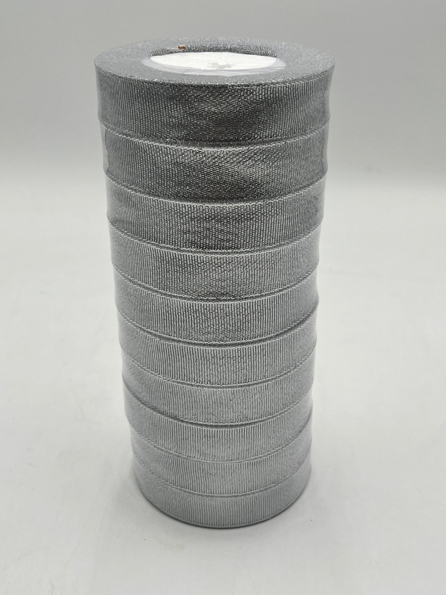 Silver polyester ribbon rolls in 1” x 25 yards, ideal for floral design, gifts and crafts. Pack of 10 sold at wholesale price by floralsuppliespoint1.com.
