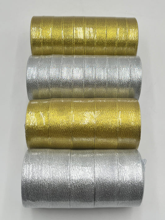 Gold and silver polyester ribbon rolls in 1" or 2" x 25 yards, ideal for floral design, gifts and crafts. Sold individually or packs by floralsuppliespoint1.com
