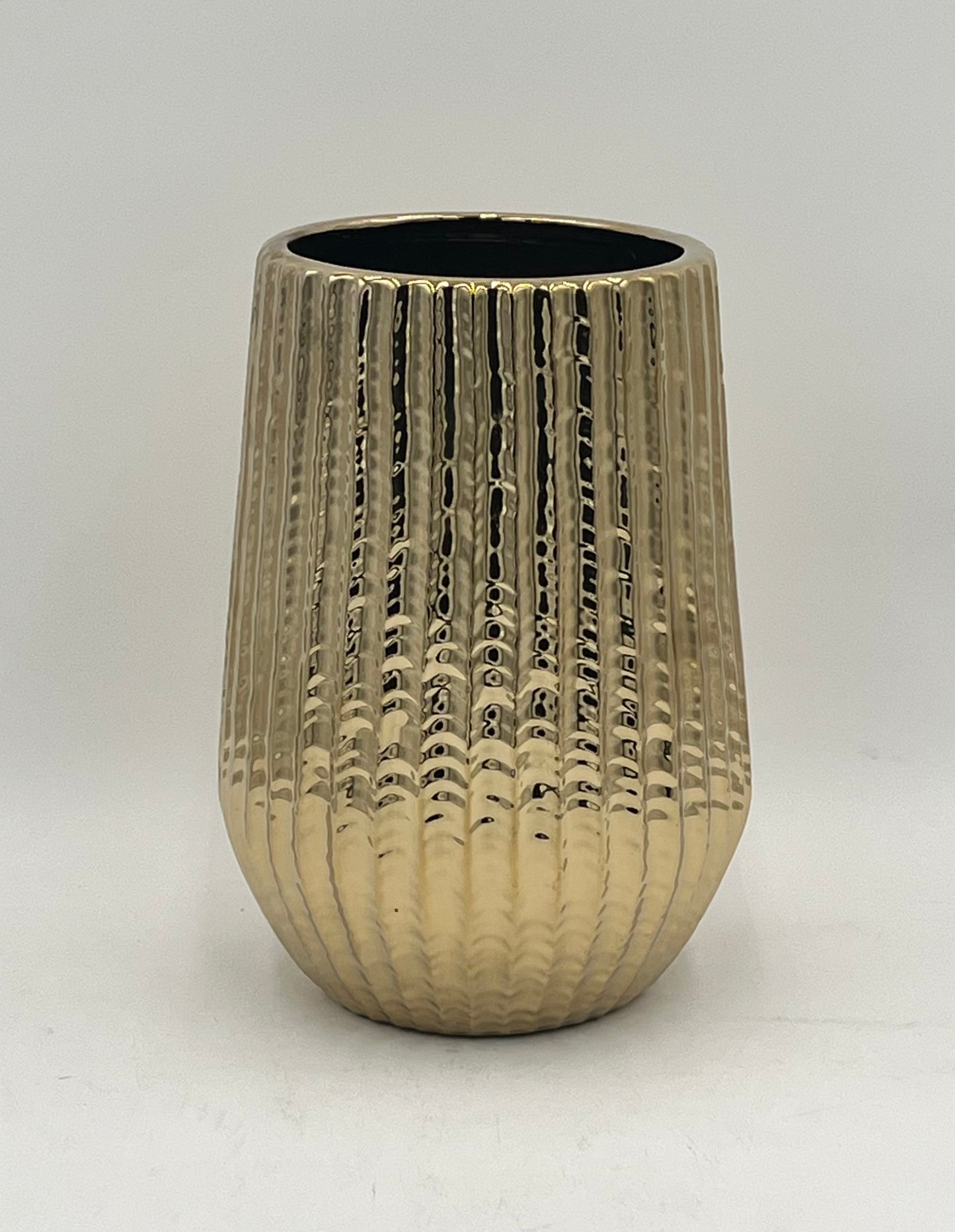 Solonique ceramic vases with gold metallic ribbed finish. Elegant modern décor for floral displays sold by floralsuppliespoint1.com.