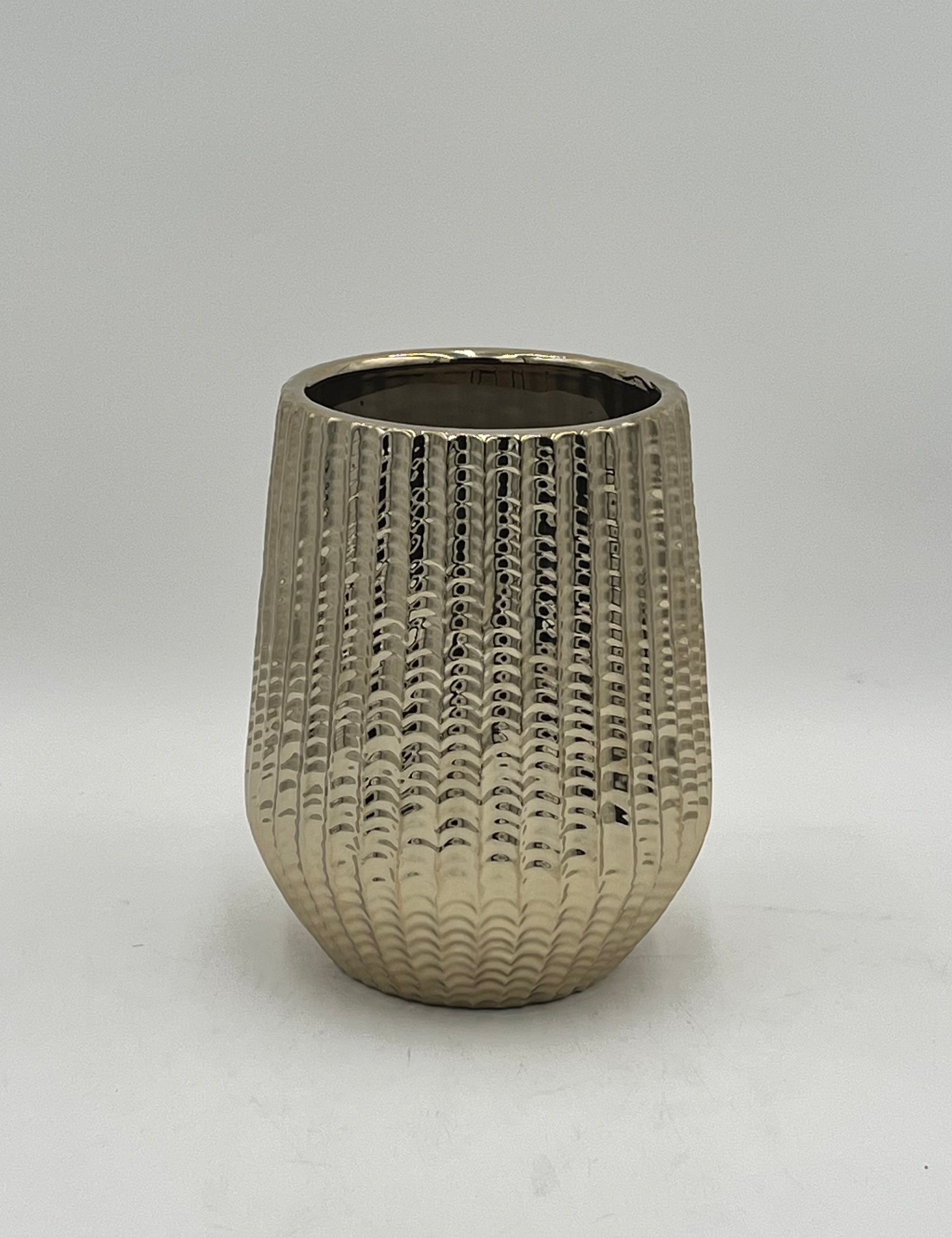Solonique ceramic vases with gold metallic ribbed finish. Elegant modern décor for floral displays sold by floralsuppliespoint1.com.