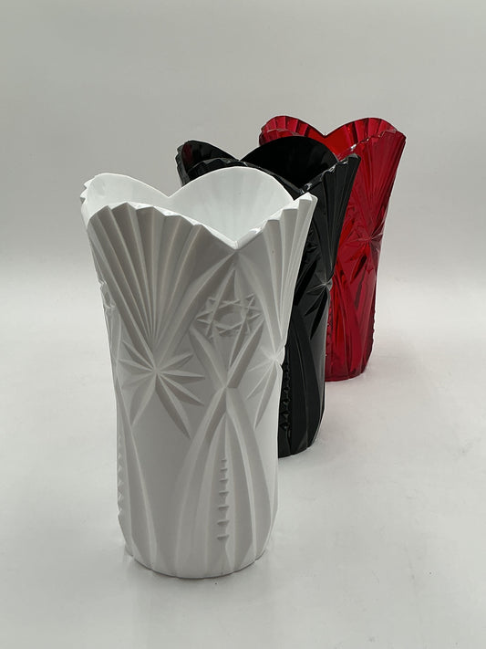 Starlight Design Collection vessels 10x6 Op with starburst pattern in red, black & white are durable plastic, elegant & 9.99 @. Sold by floralsuppliespoint1.com