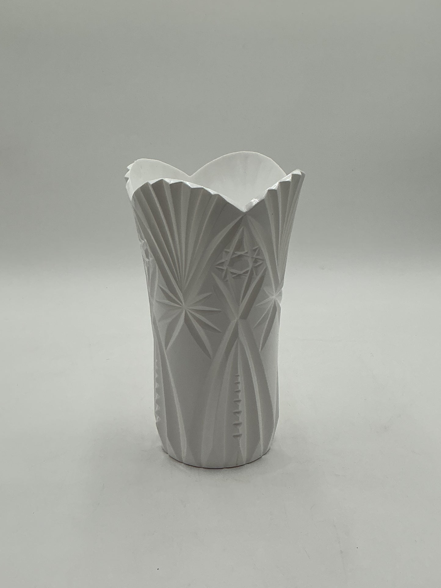 Starlight Design Collection vessels 10x6 Op with starburst pattern in white is a durable plastic, elegant & 9.99 each. Sold by floralsuppliespoint1.com