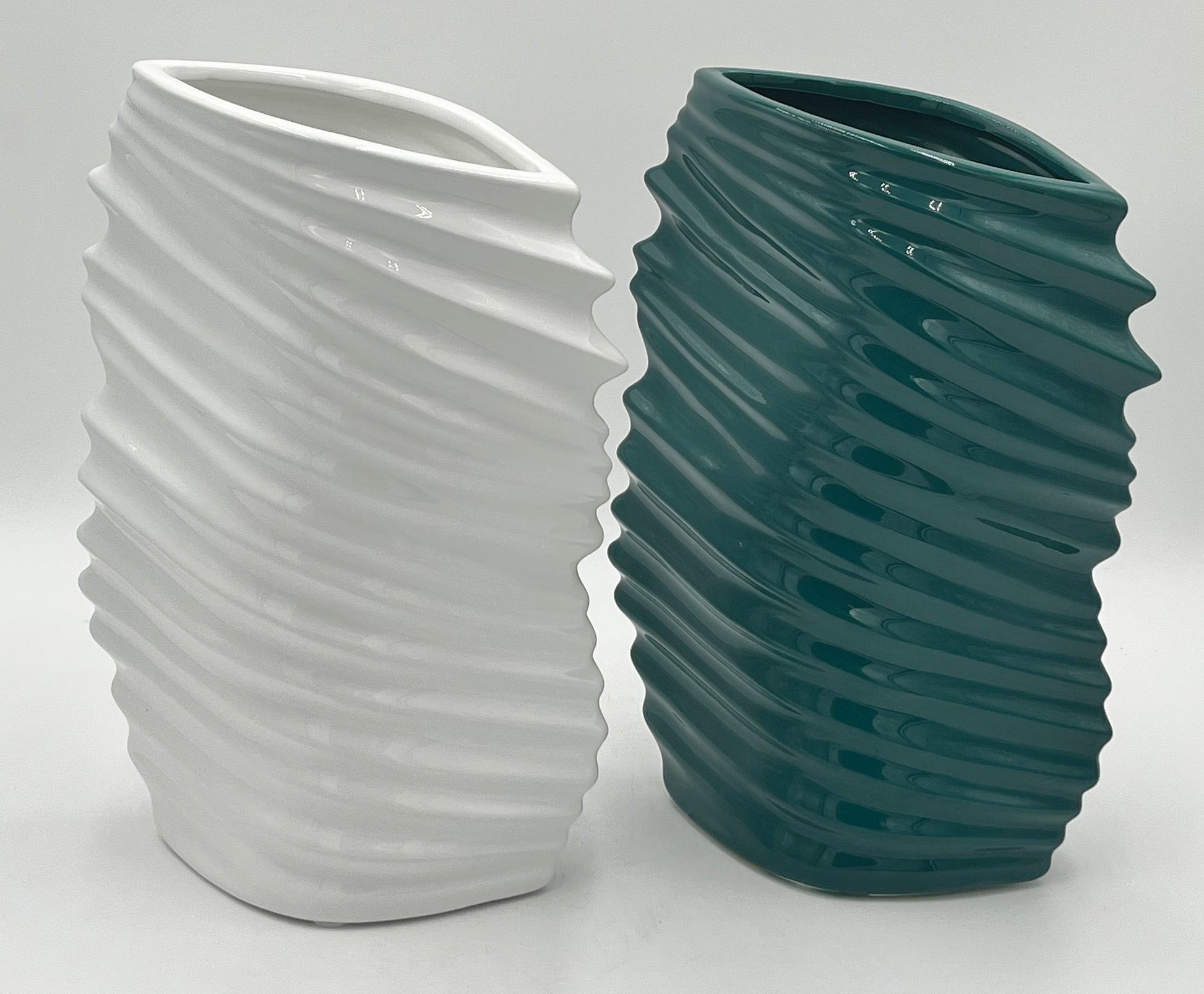Tidal Crest ceramic vases in gloss white and deep teal with wave-textured design, sold by floralsuppliespoint1.com. 12" tall, 6" opening, 3 lbs each—ideal for contemporary floral displays.