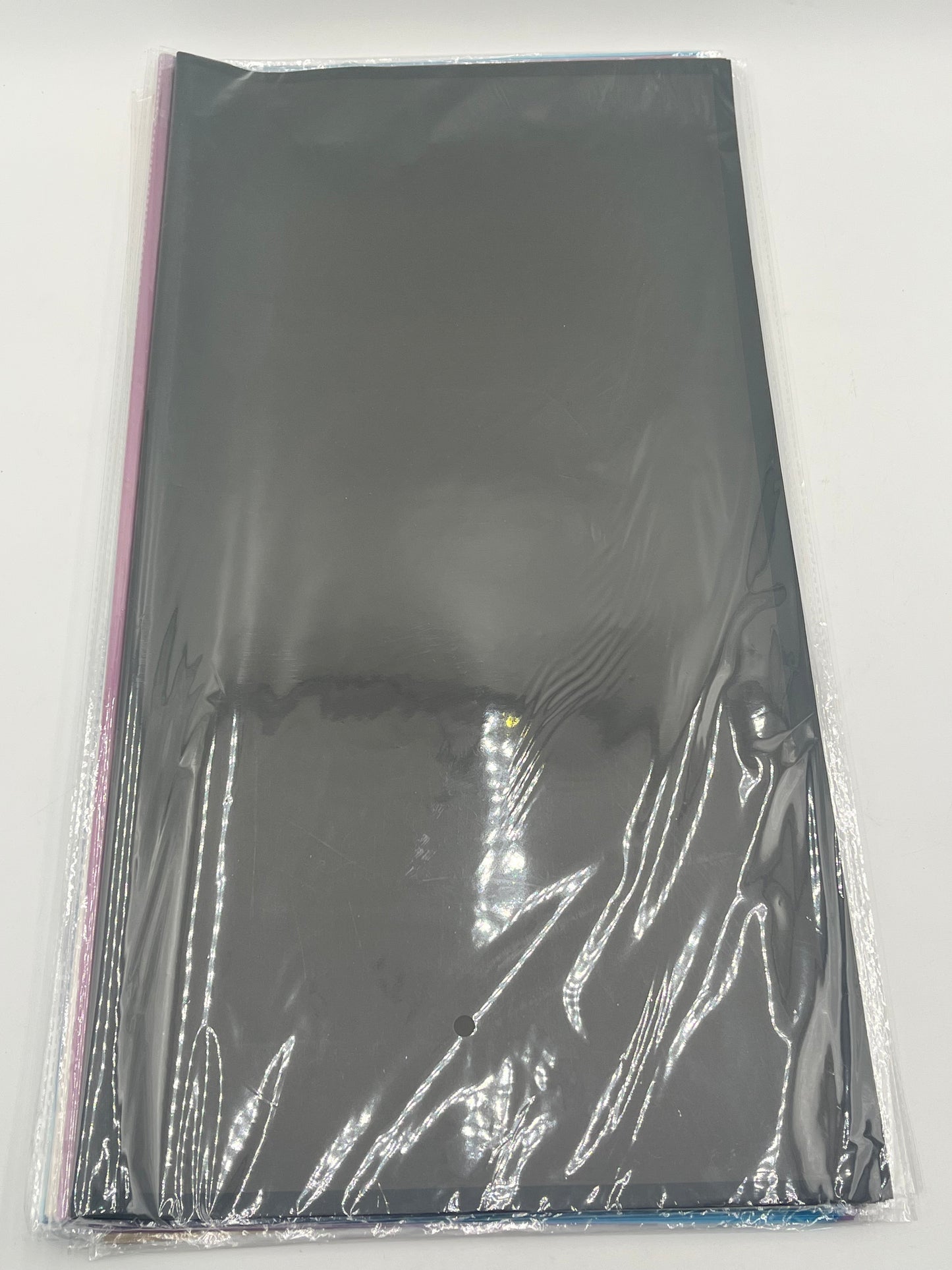 Translucent wrapping papers with 1/4" accent trim in Black color. 20-pack sheets elevate bouquets, gifts & baskets. Sold by floralsuppliespoint1.com for $9.99