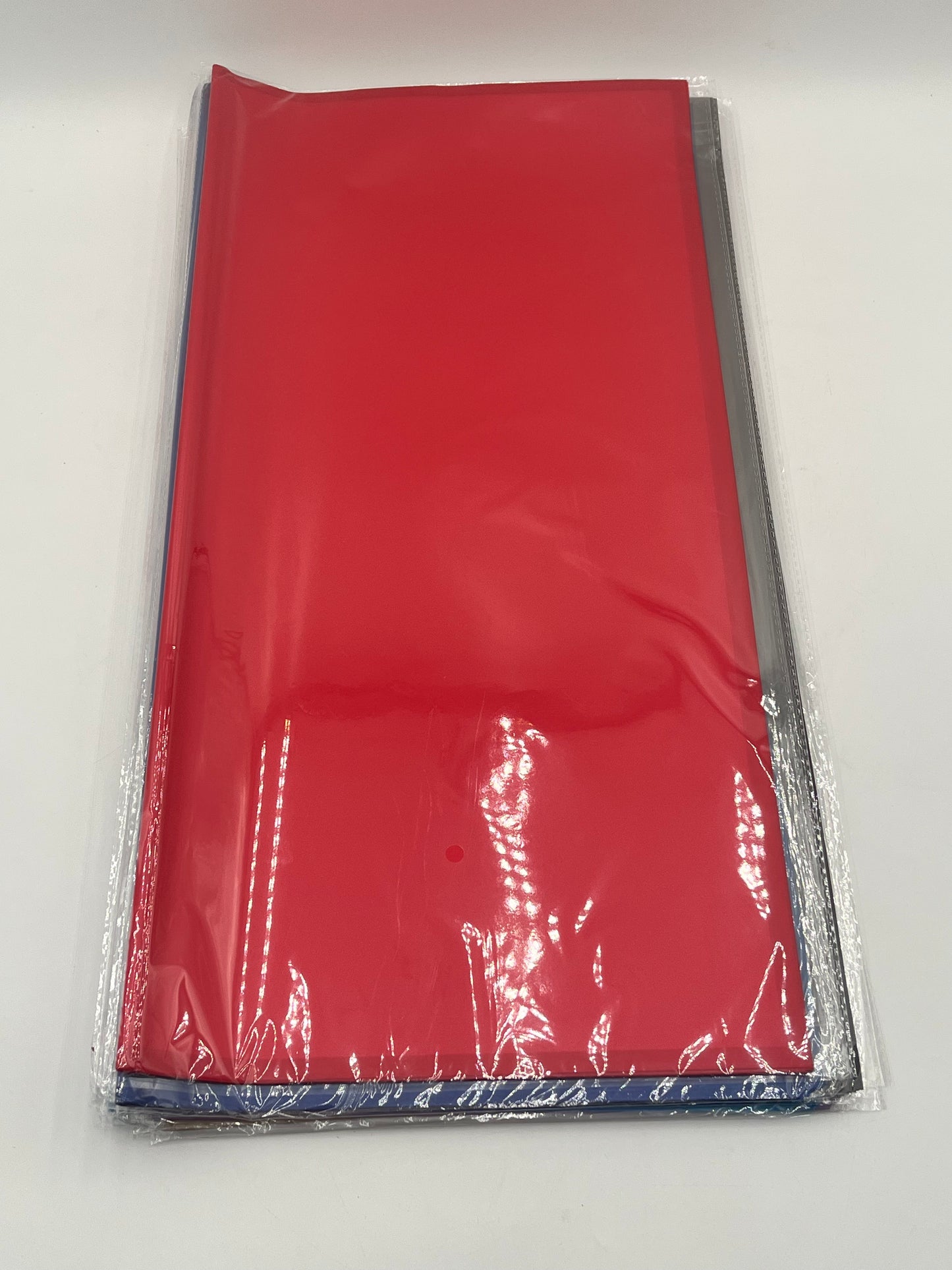 Translucent wrapping papers with 1/4" accent trim in Red color. 20-pack sheets elevate bouquets, gifts & baskets. Sold by floralsuppliespoint1.com for $9.99