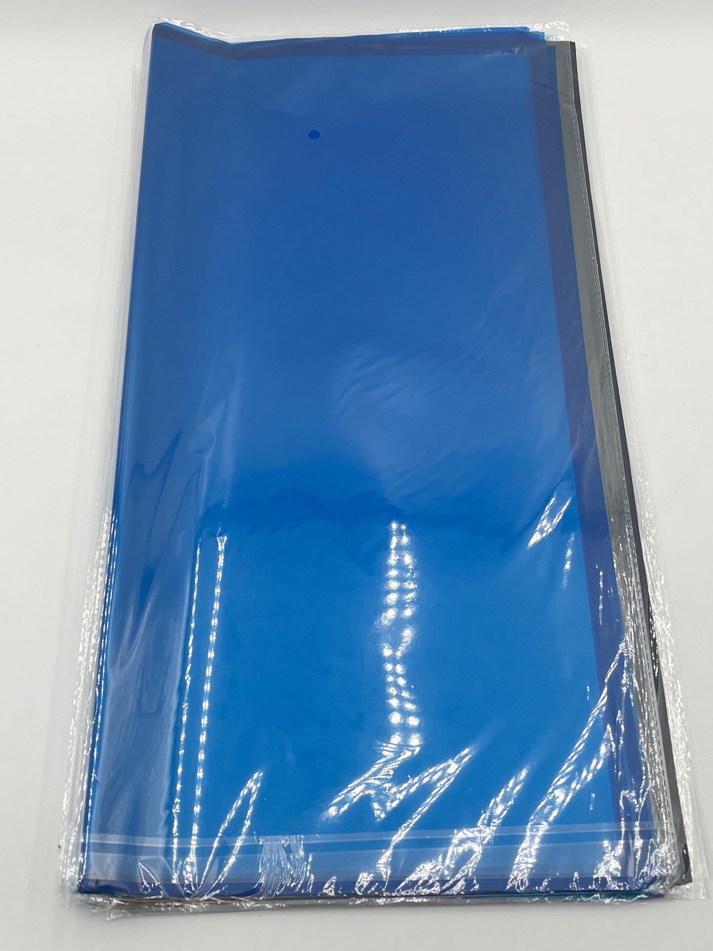 Translucent wrapping papers with 1/4" accent trim in Royal blue color. 20-pack sheets elevate bouquets, gifts & baskets. Sold by floralsuppliespoint1.com for $9.99