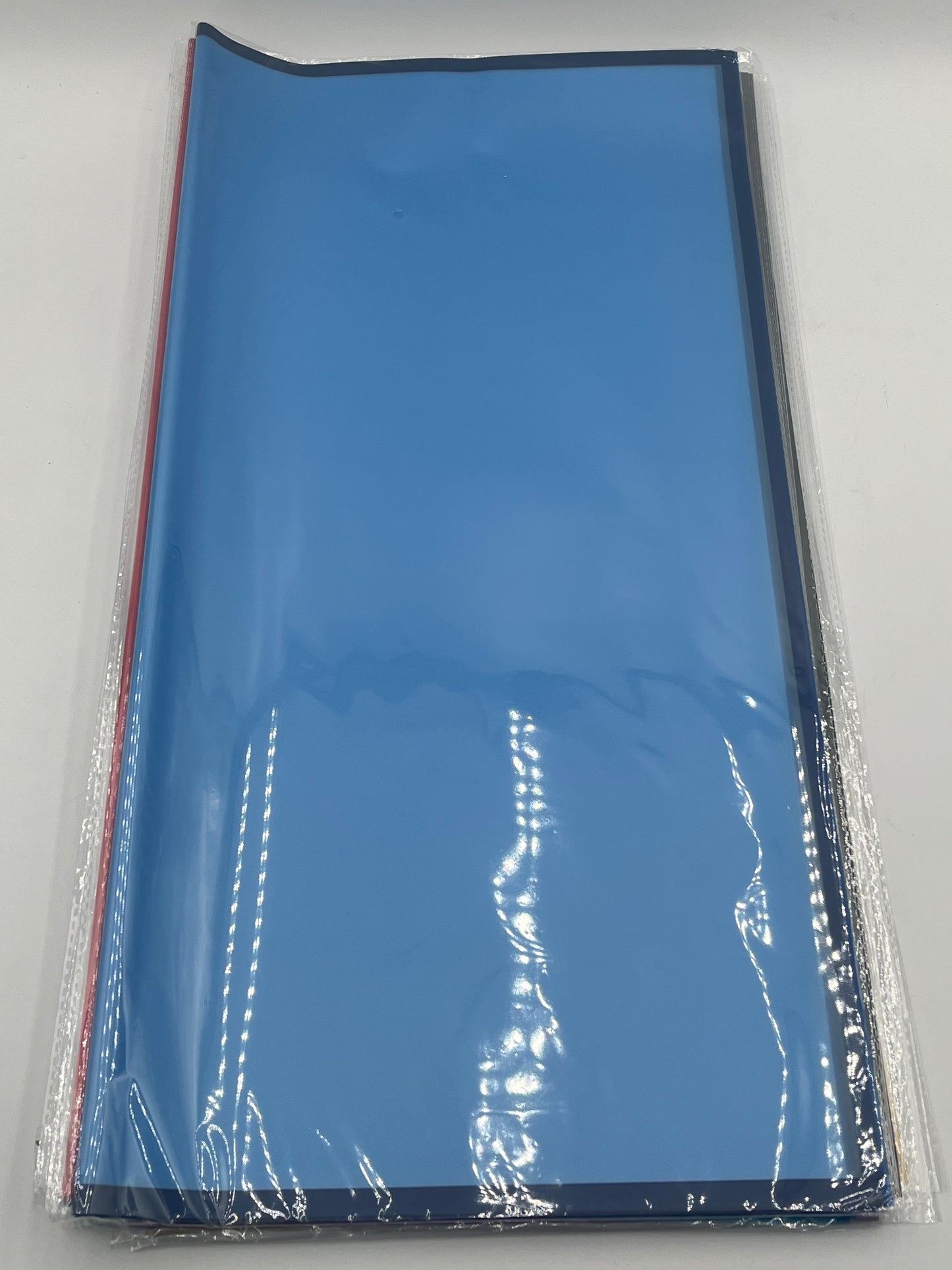 Translucent wrapping papers with 1/4" accent trim in Sky blue color. 20-pack sheets elevate bouquets, gifts & baskets. Sold by floralsuppliespoint1.com for $9.99