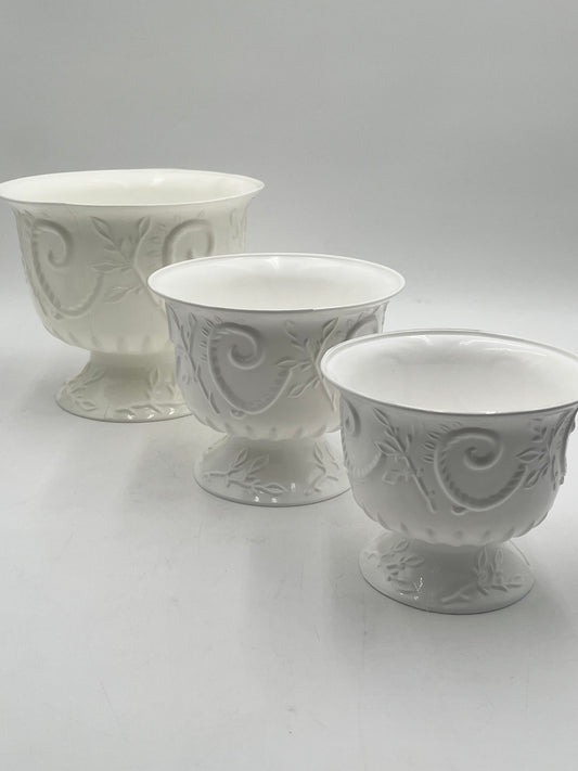 White Empress Urn Collection in 3 sizes. Elegant scrollwork pedestal urns for floral designs, décor, centerpieces or events- sold by floralsuppliespoint1.com